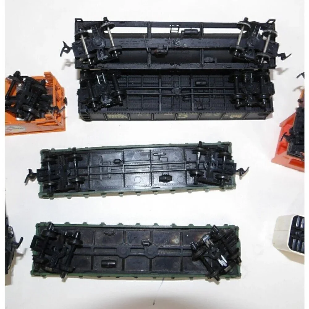 12 Model train plastic tankers, coal cars & piggy back HO gauge vintage 